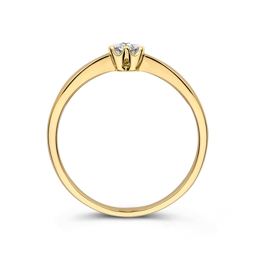 Bague en or jaune avec sertissage en forme de cœur et diamant brillant 0.05 crt.