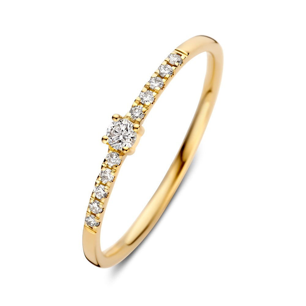 Bague en or jaune avec un brillant central de 0,12 ct et des diamants sur le contour.