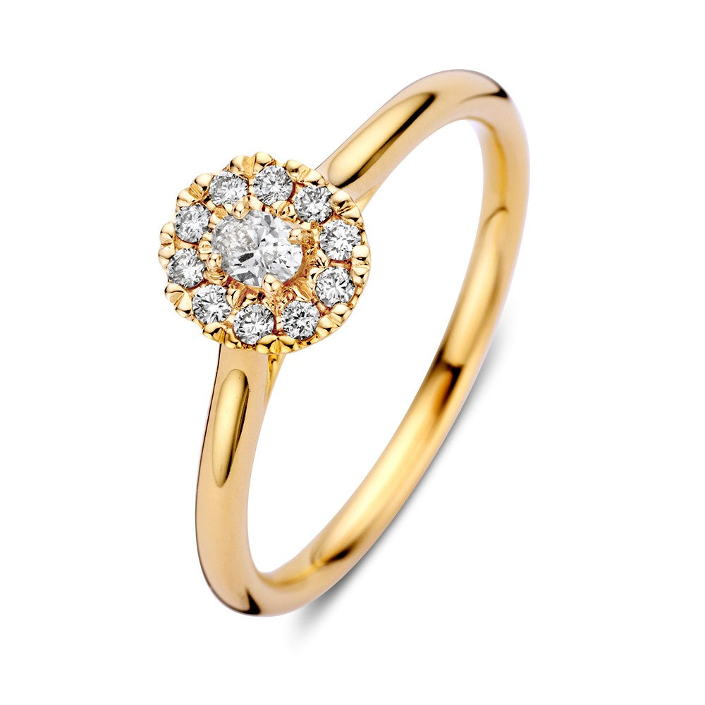 Bague en or jaune 14 carats avec un halo de diamants et une pierre centrale en forme ovale.