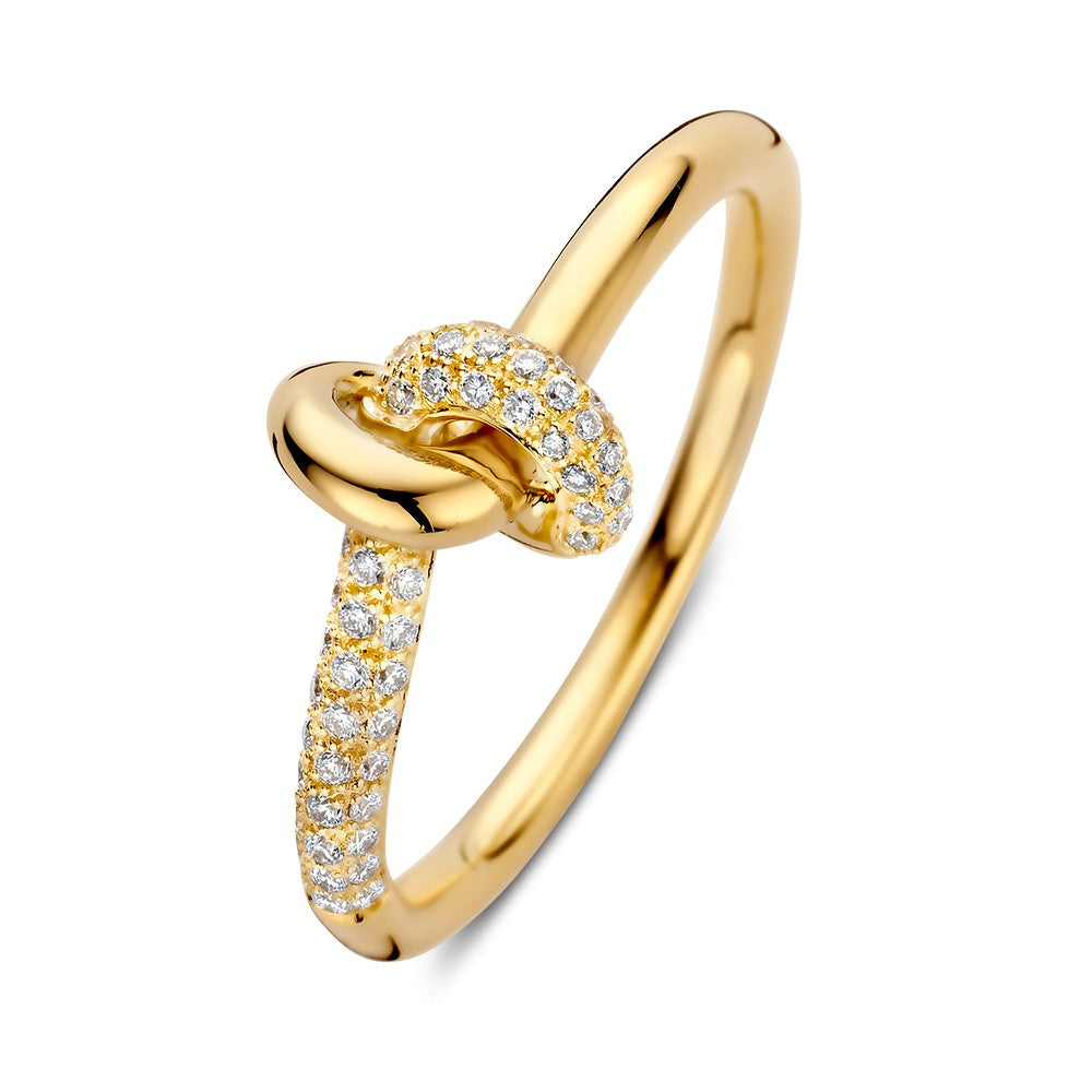 Bague en or jaune élégante avec un diamant brillant de 0,21 ct et un design noué.