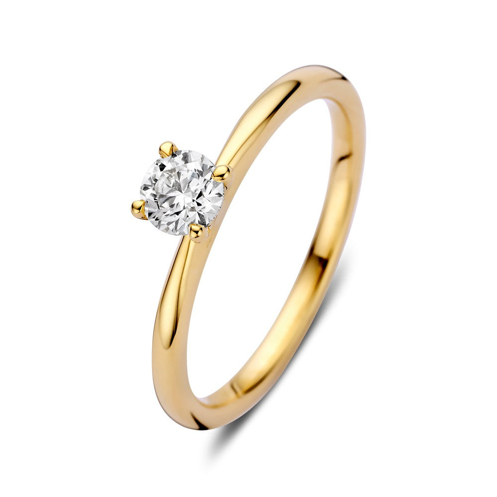 Bague en or avec un solitaire de 0,40 ct, serti de quatre griffes, au design élégant.