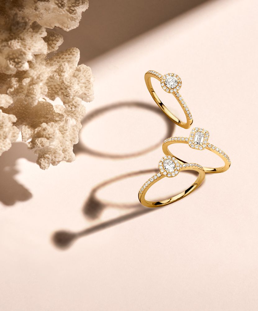 Bague élégante en or jaune avec 0,20 ct de diamant et halo de diamants