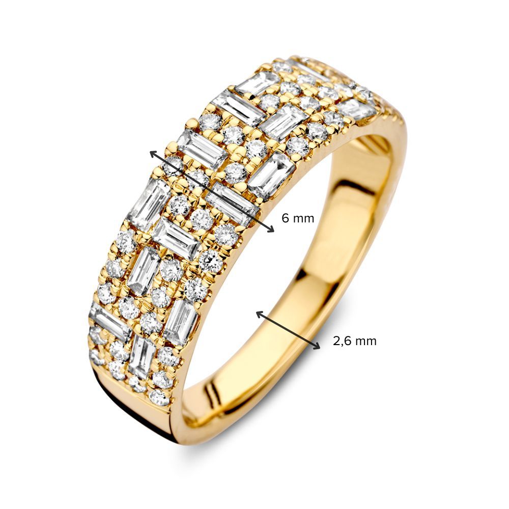 Bague en or jaune élégant avec diamants brillants et taille baguette 0,94 crt.