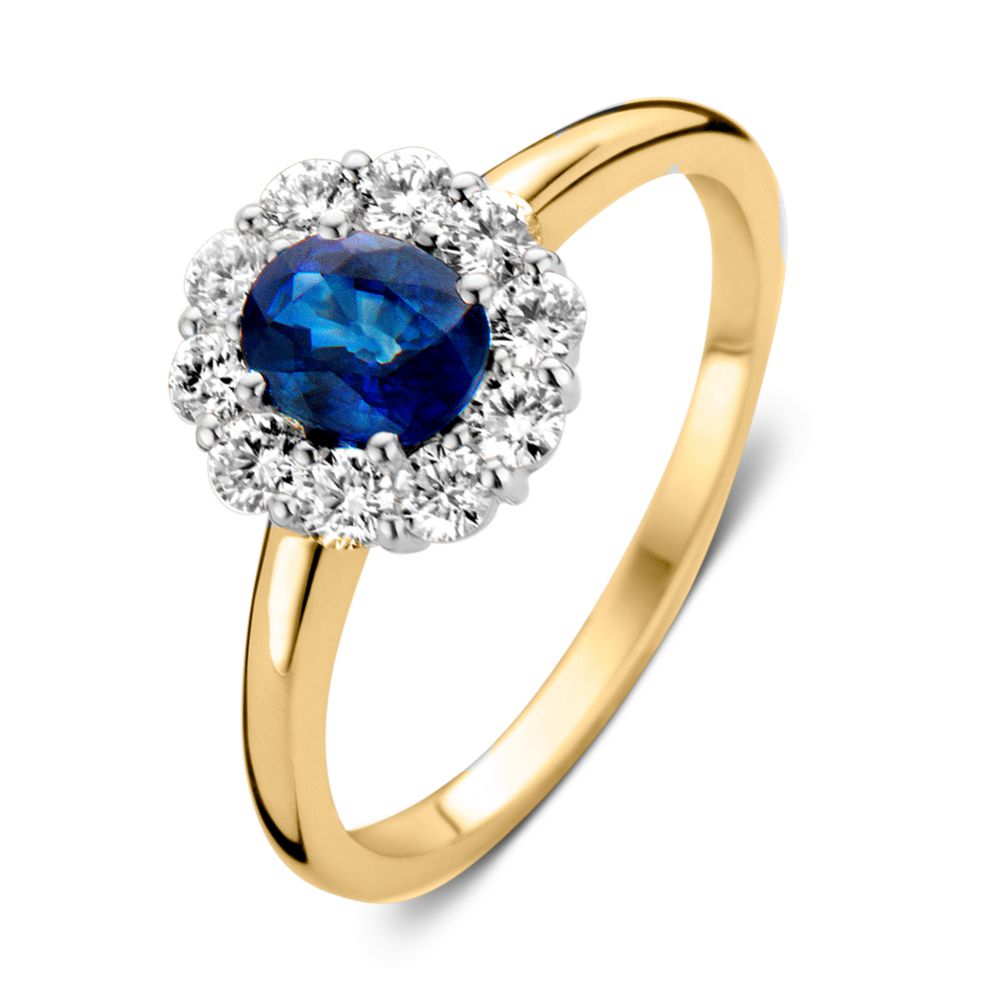 Bague en or jaune élégante avec un saphir bleu et des diamants brillants.