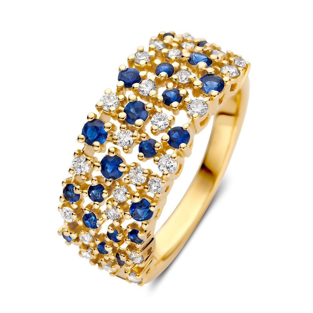 Bague en or jaune ornée de brillants et de saphirs.