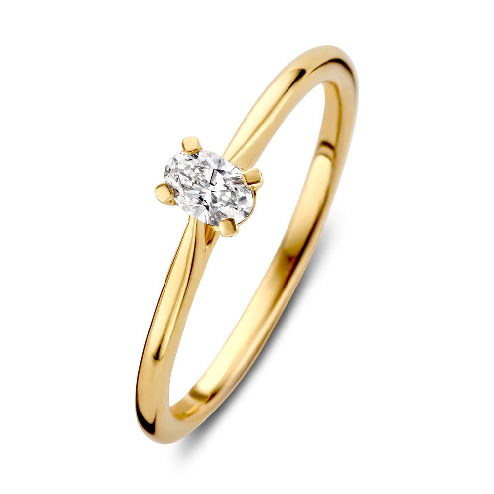 Bague en or jaune 14 carats avec diamant ovale de 0,16 carat, serti de quatre griffes.