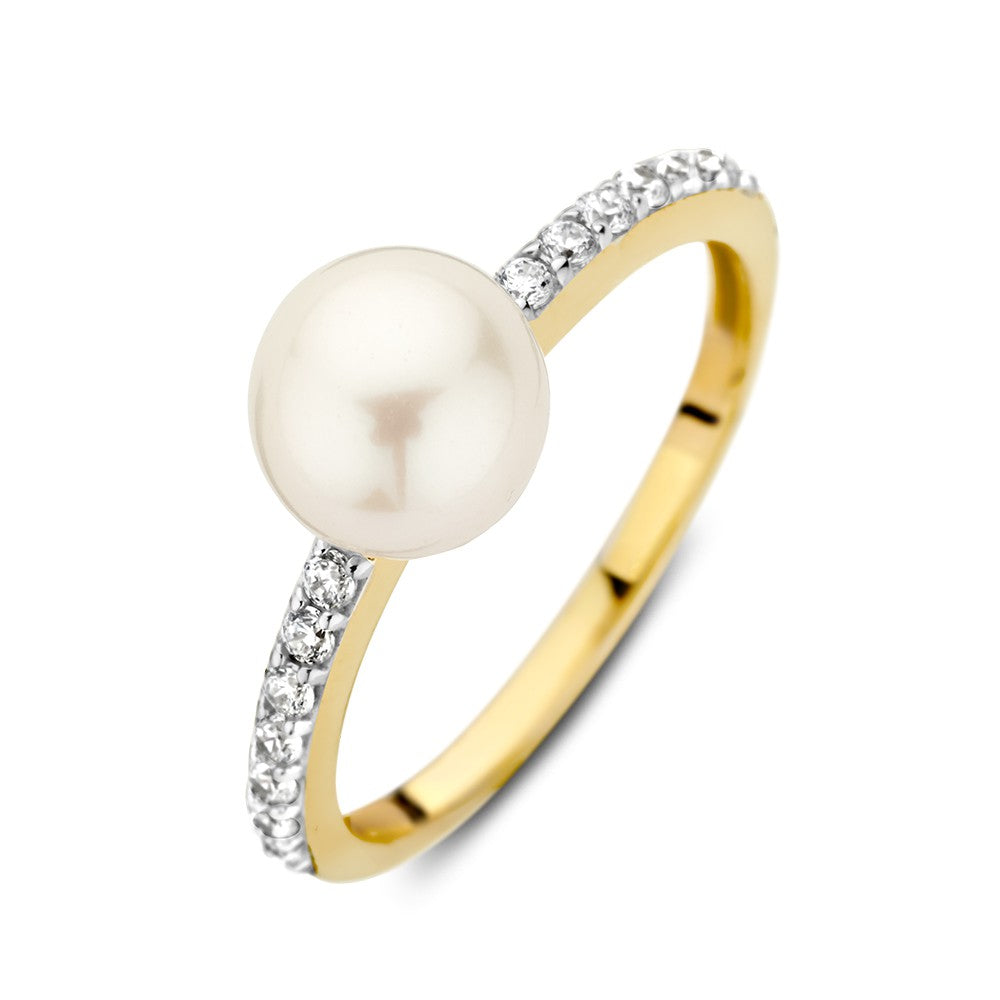 Bague en or 14K avec une perle d'eau douce et des zirconiums, design élégant.