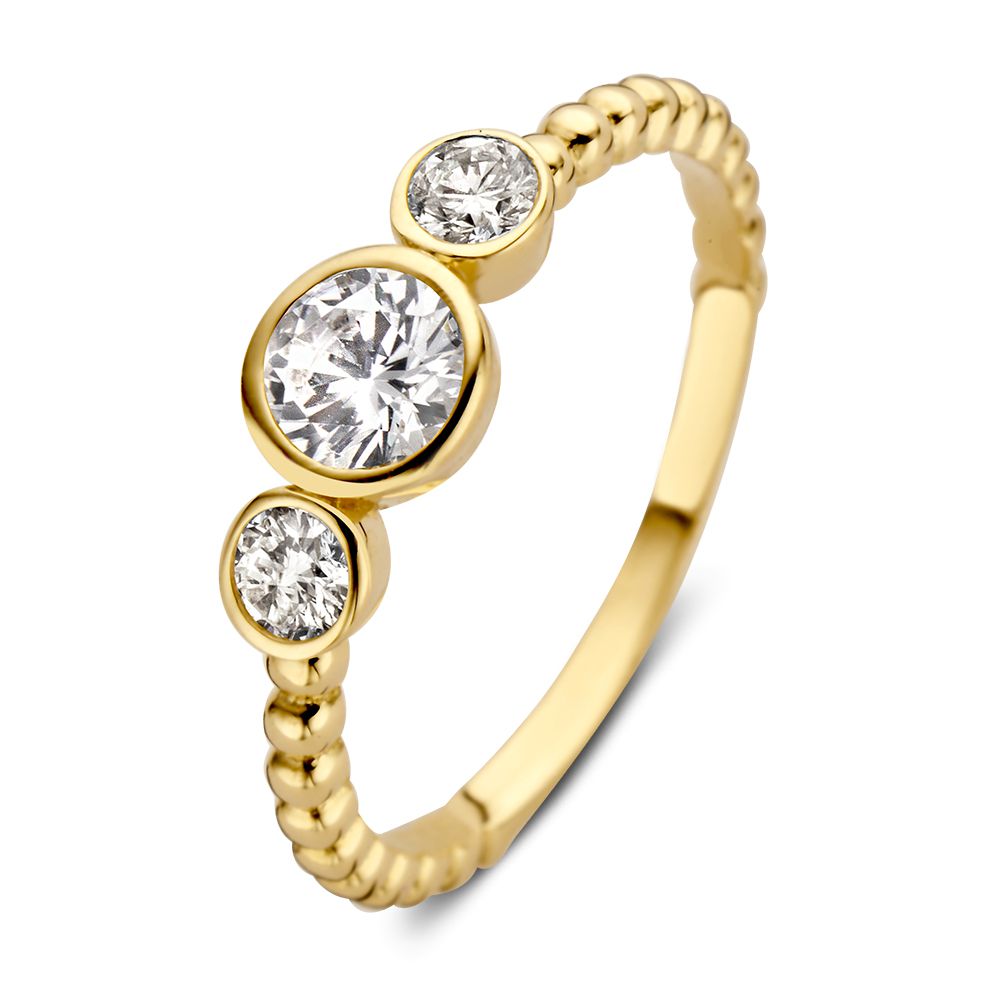 Bague en or jaune 14 carats avec trois zircons, finition torsadée.