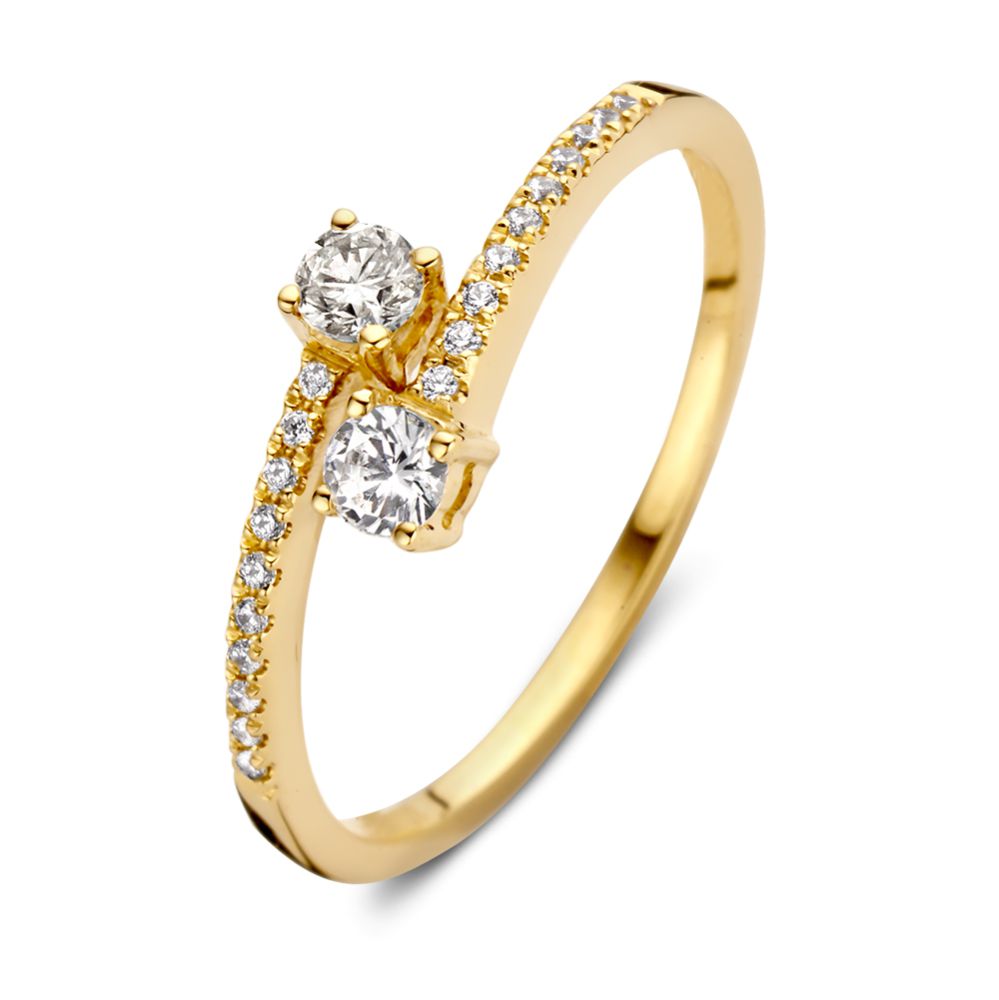 Bague en or jaune 14 carats avec double bande et zircons, ornée de deux pierres brillantes.