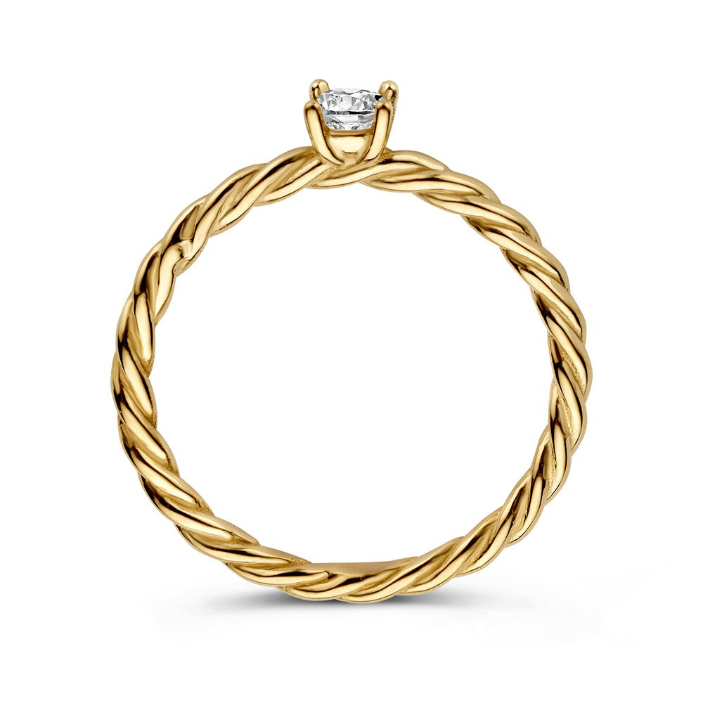 Bague solitaire en or avec bande torsadée et zircone – Élégance intemporelle