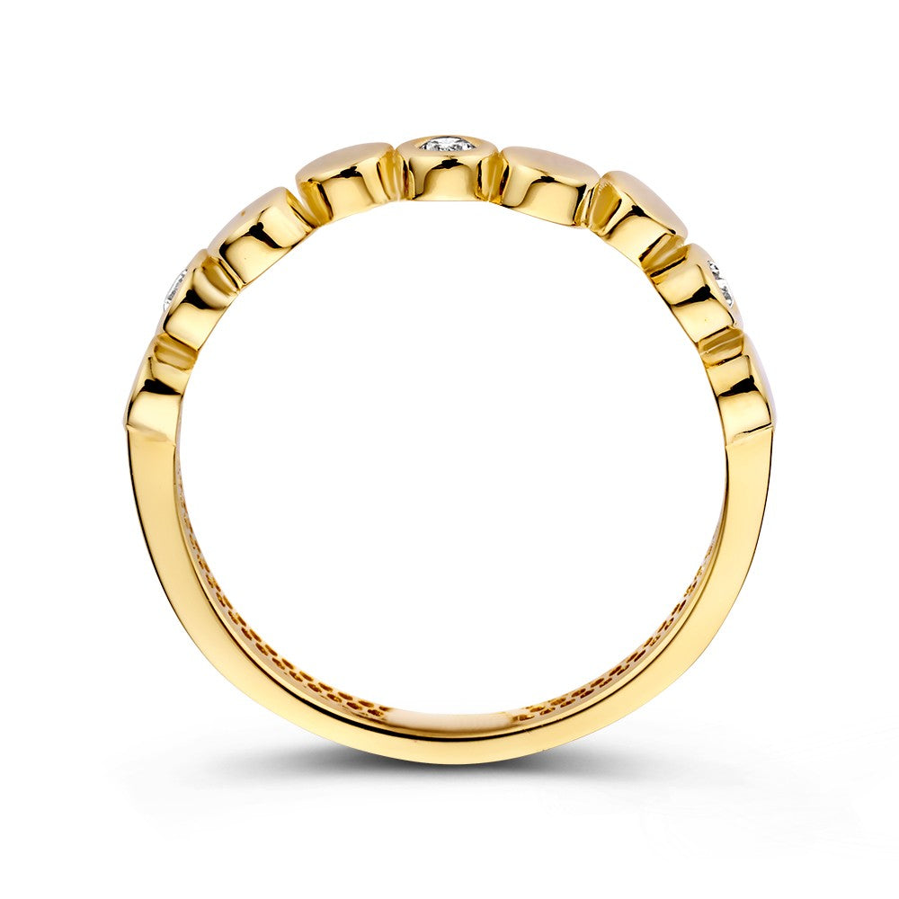 Bague en or jaune avec des éléments ronds ludiques et des zircones scintillantes