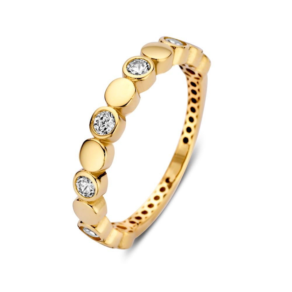 Bague en or jaune ornée de zirconiums scintillants et d'éléments ronds.