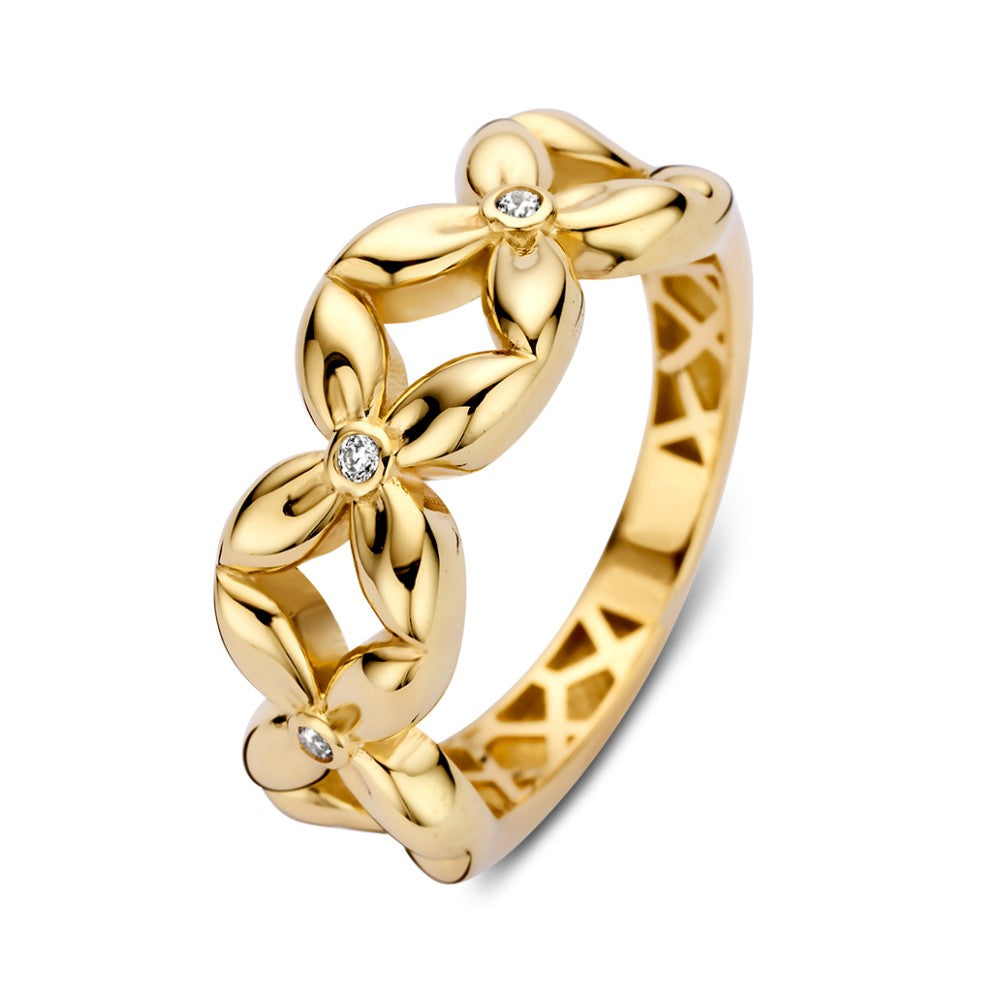 Bague en or jaune large avec motif floral et cœurs en zirconium.