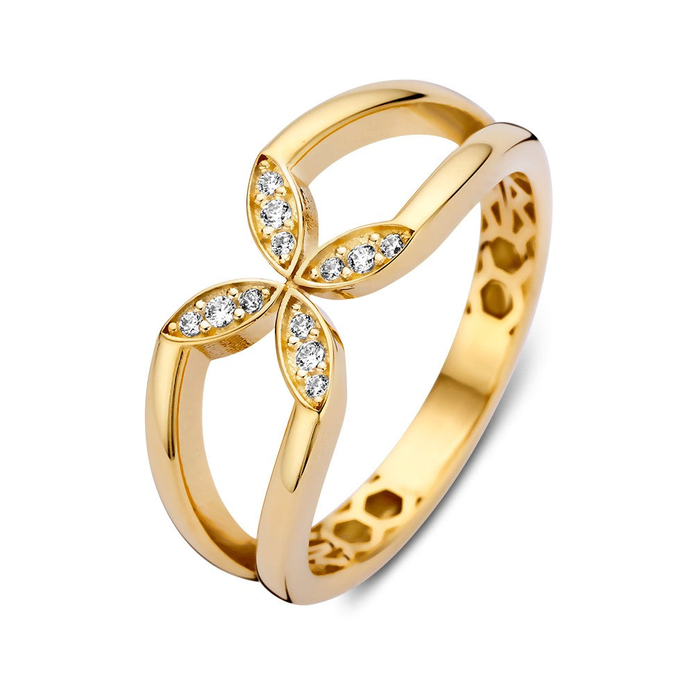 Bague en or jaune avec un design floral et des zircons brillants.