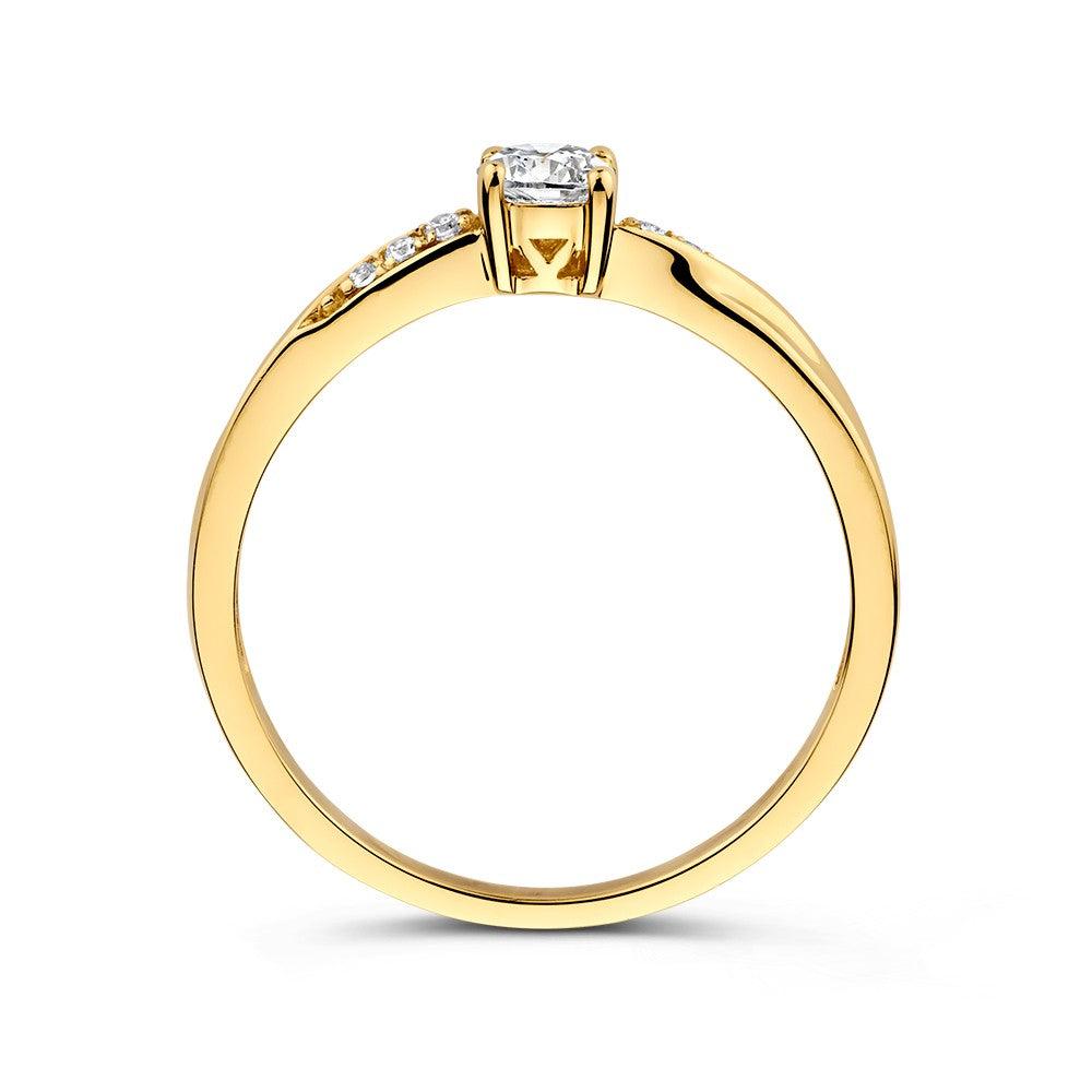Bague en or jaune solitaire avec zircones et twist ludique