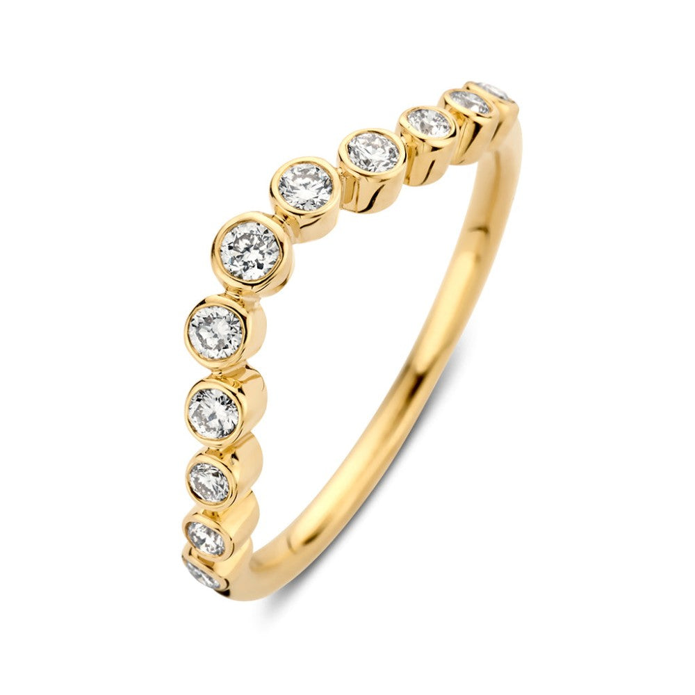 Bague en or jaune avec des diamants ronds de 0,26 carat disposés en vagues.