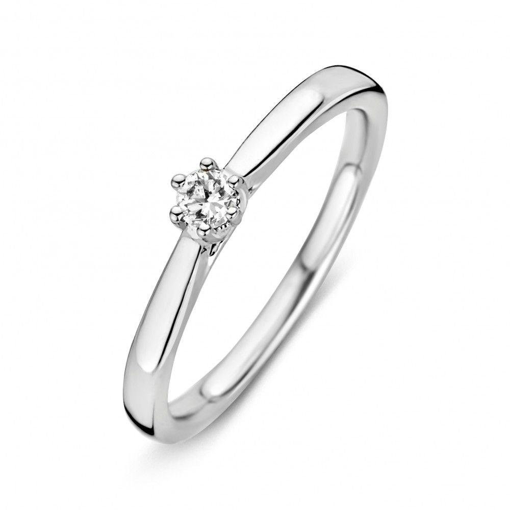 Bague en or blanc avec un diamant de 0,09 ct, design simple et élégant.