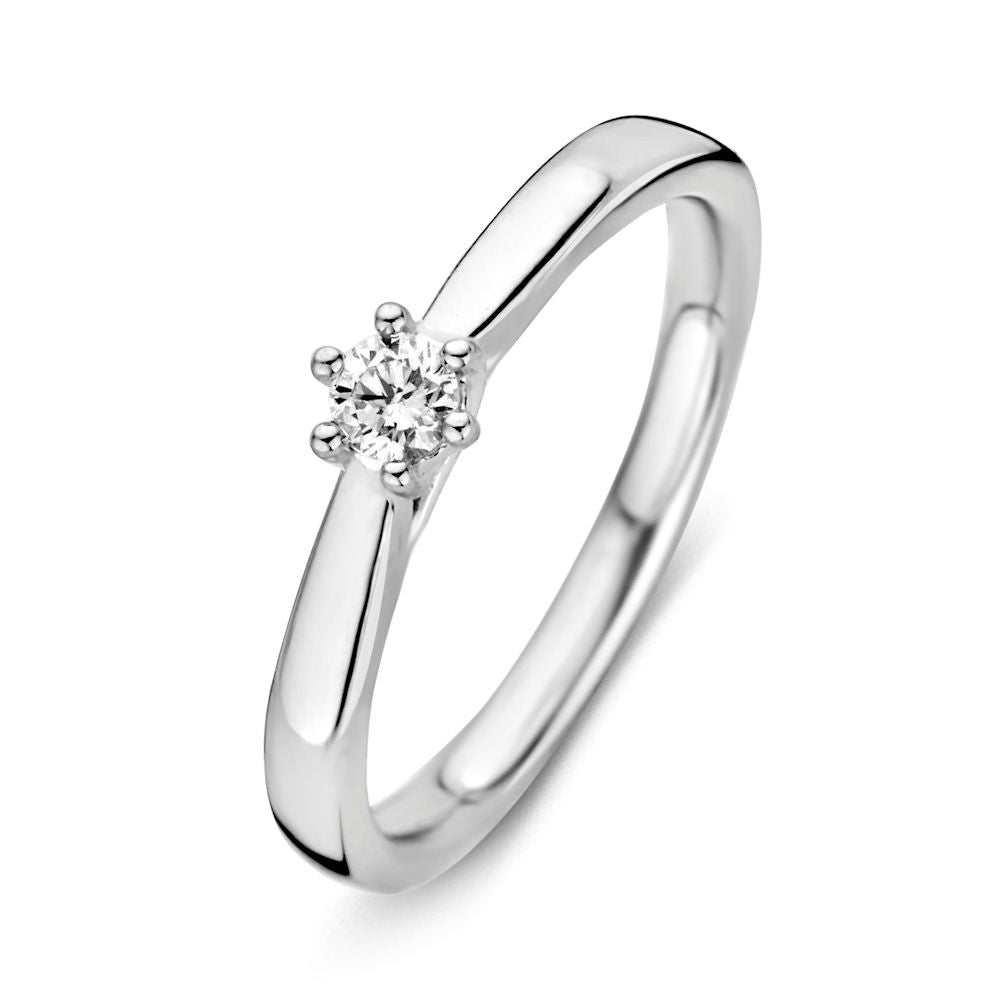 Bague en or blanc 14 carats avec un diamant brillant de 0,14 carat.