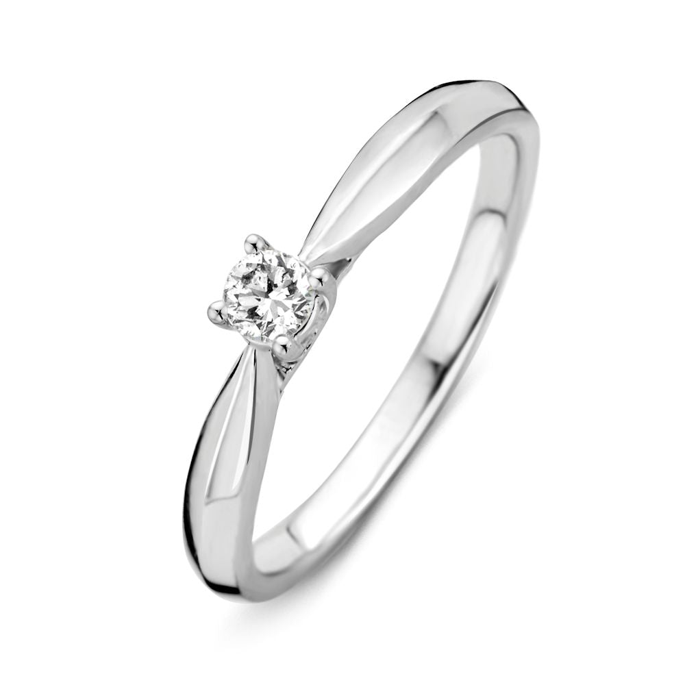 Bague en or blanc 14 carats avec un diamant brillant au centre.