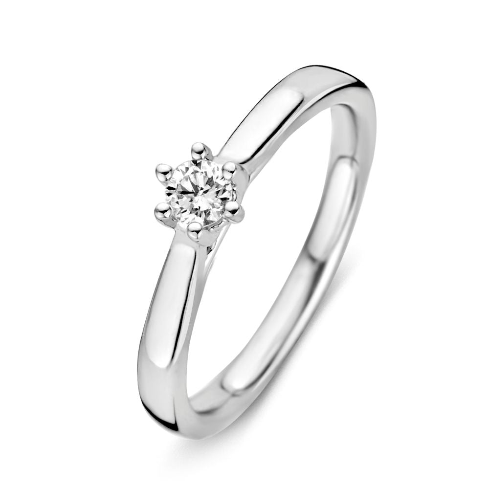 Bague en or blanc 14 carats avec un diamant brillant de 0,19 carat.