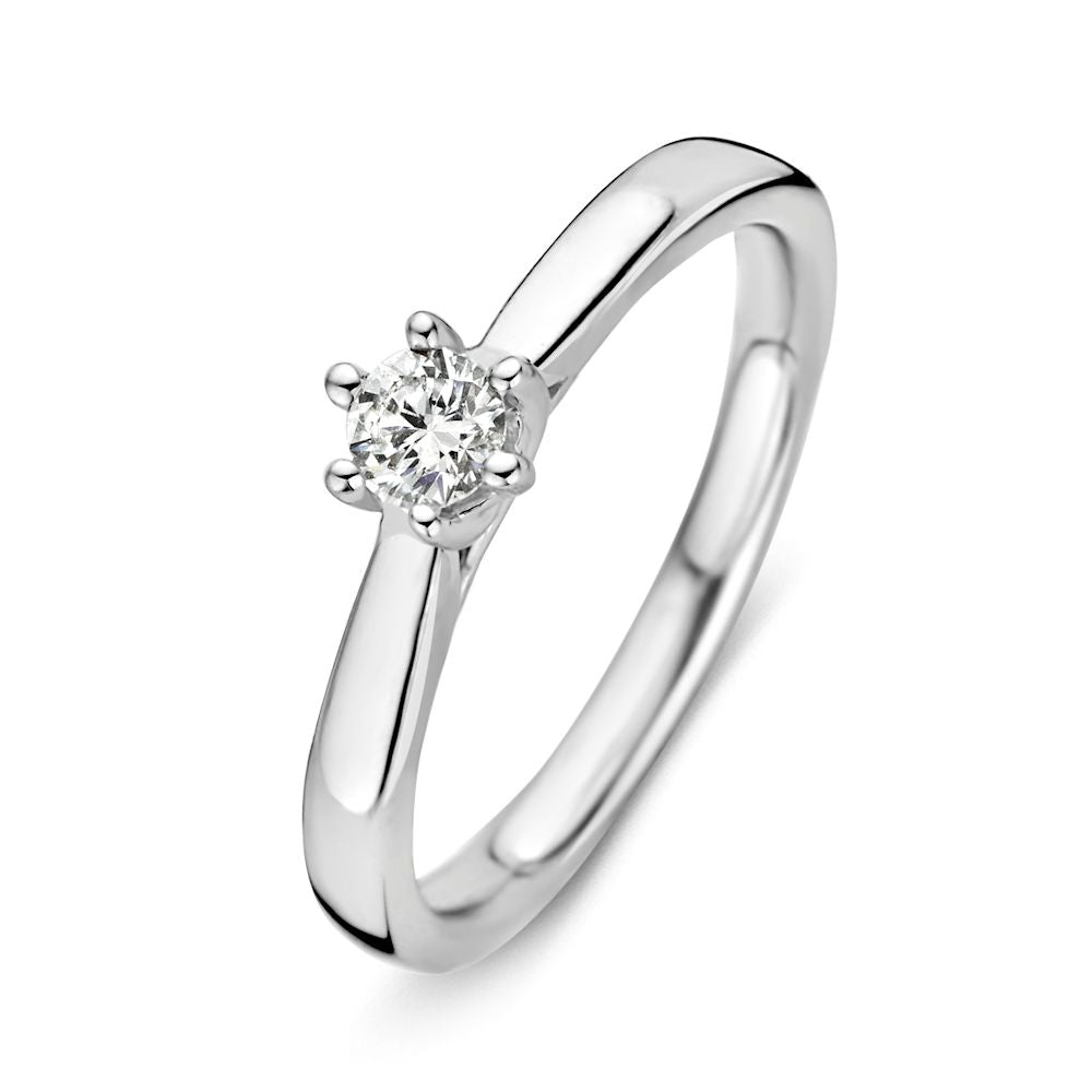 Bague en or blanc sophistiquée avec un diamant brillant de 0,24 carat.