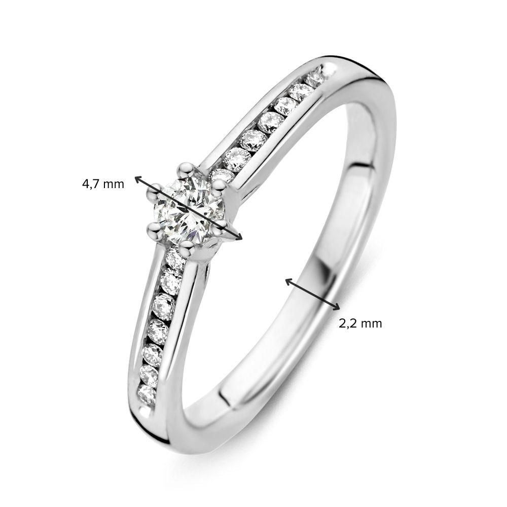 Bague en or blanc avec diamant élégant et pierre centrale brillante 0.30 crt.