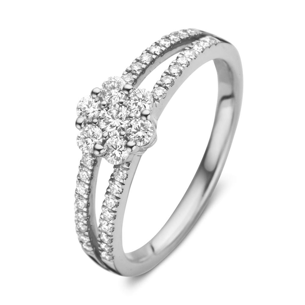 Bague en or blanc élégante avec un brillant entouré de diamants flottants de 0,55 ct.