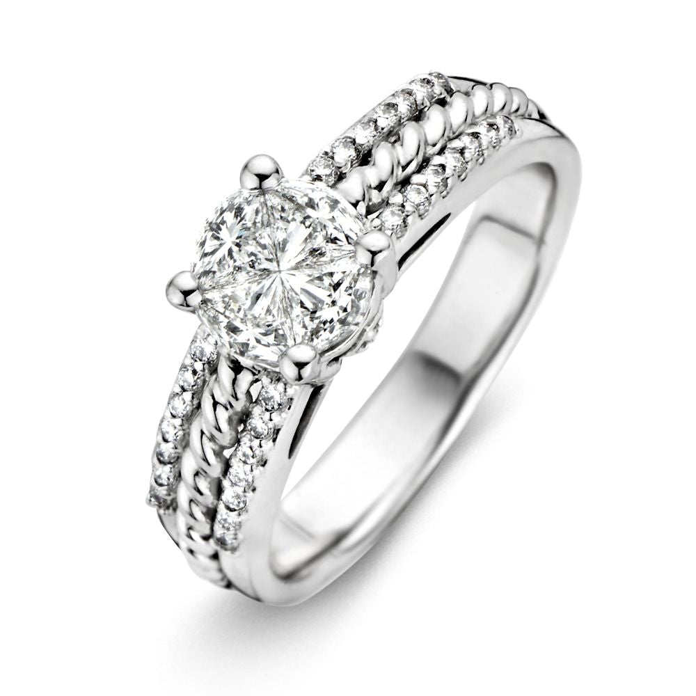 Bague en or blanc 14 carats avec un diamant brillant de 0,88 carat, qualité H/SI-1.