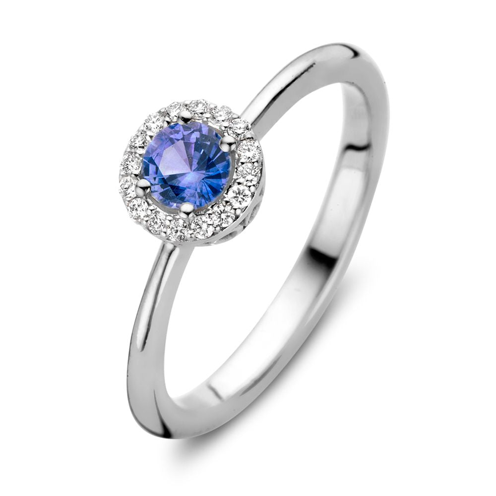 Bague en or blanc 18 carats avec saphir bleu et diamants de 0,11 ct.