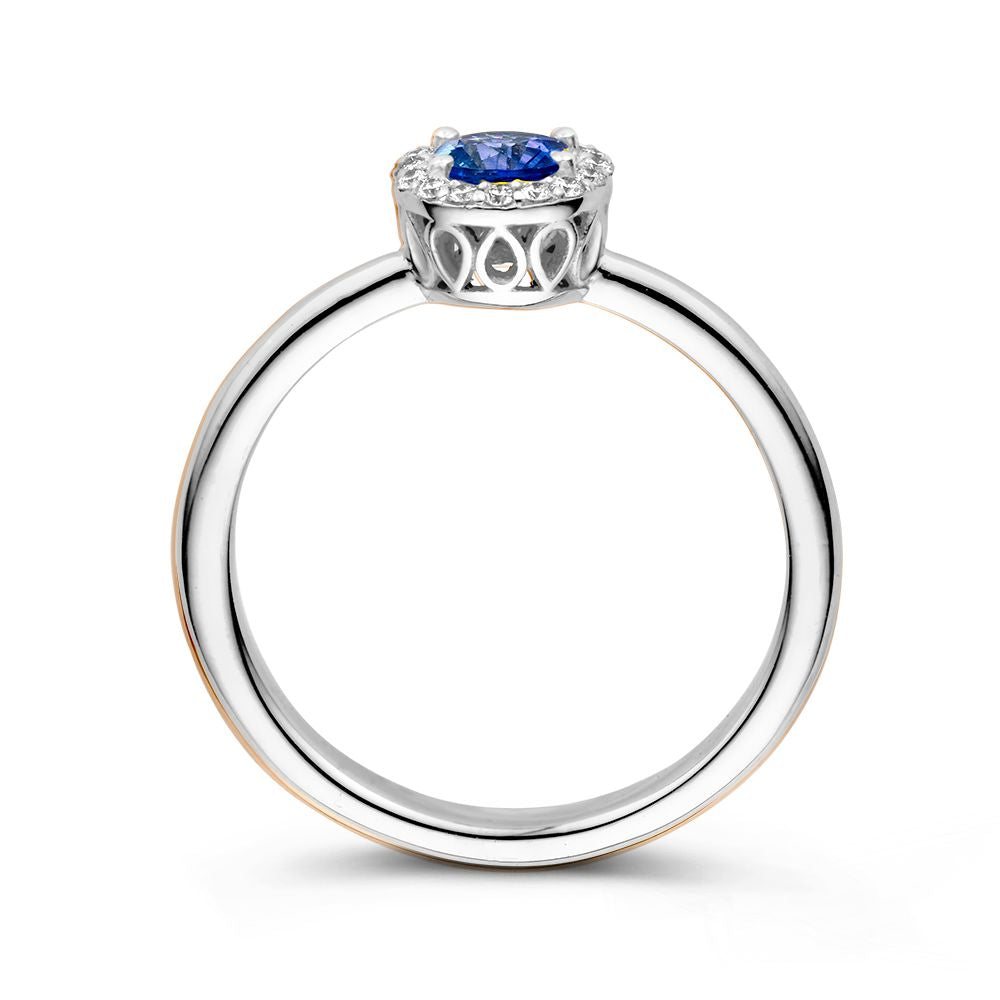 Bague en or blanc 18kt avec saphir bleu et diamants de 0,11 ct