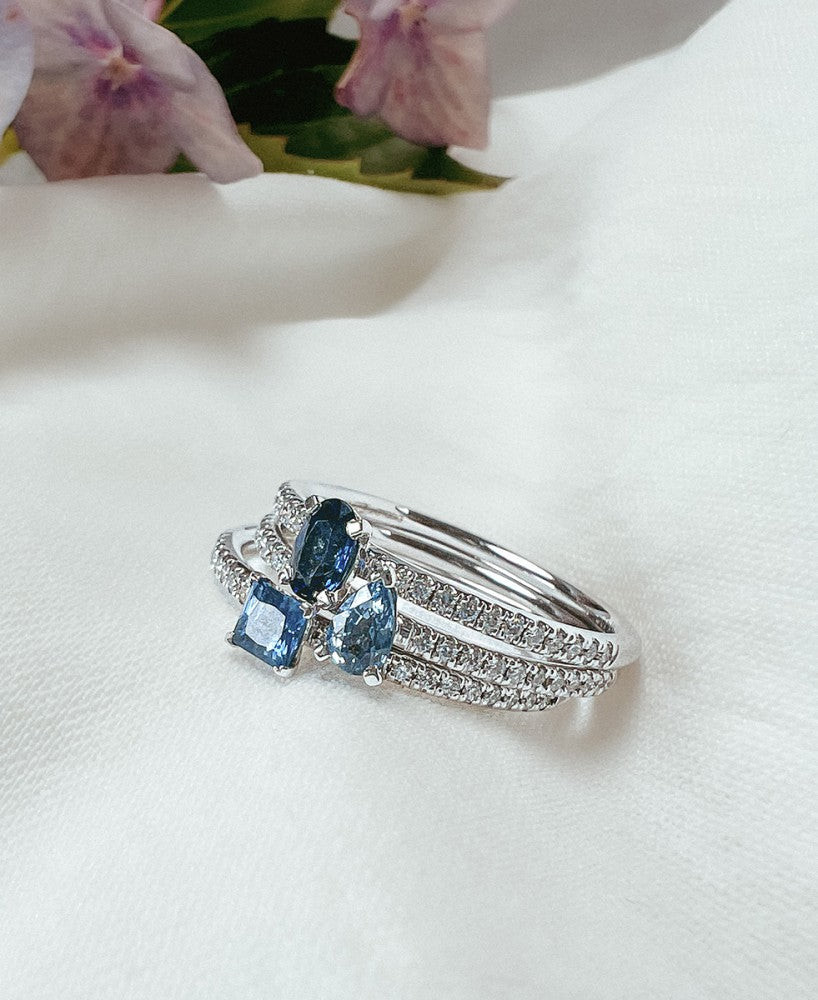 Bague en or blanc 14 carats avec saphir taillé en princesse et diamants de 0,10 carat