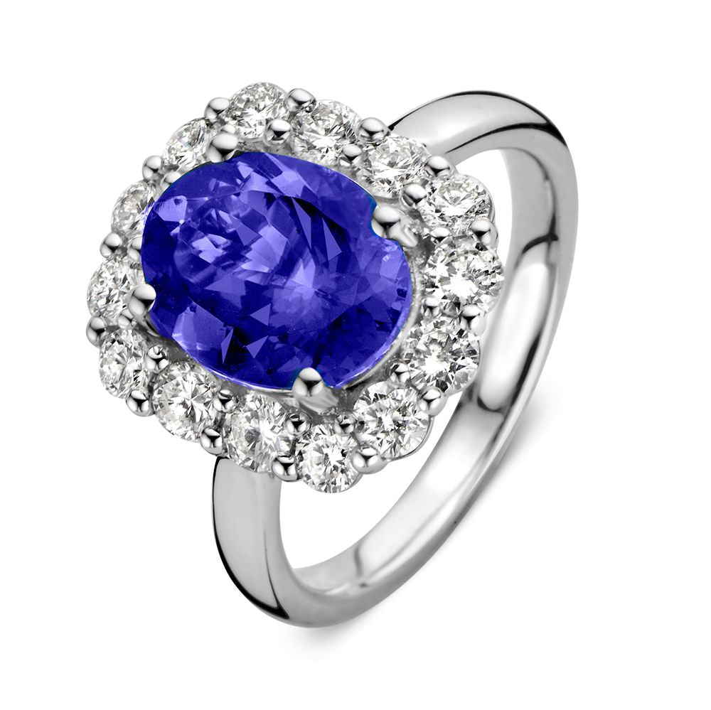 Bague en or blanc élégante avec tanzanite de 2,80 carats et halo de diamants.
