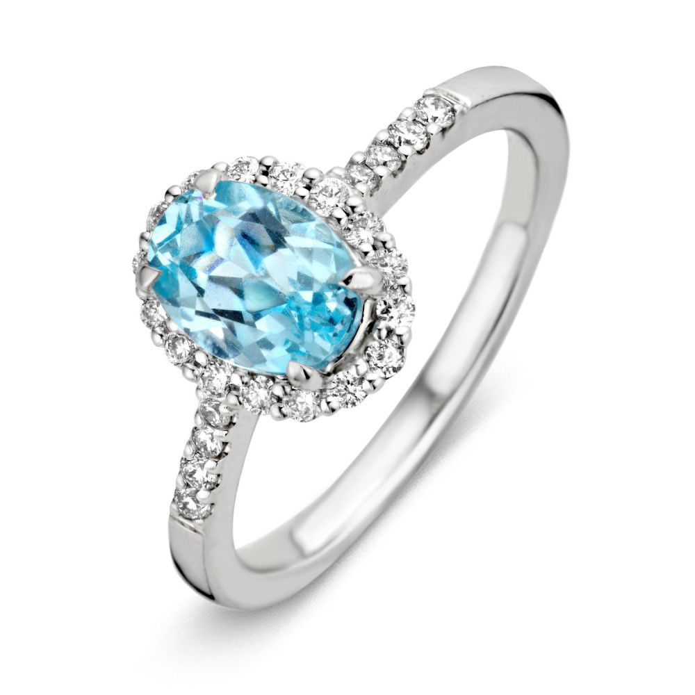 Bague en or blanc exquise avec topaze bleue de 1,70 carat et diamants brillants.
