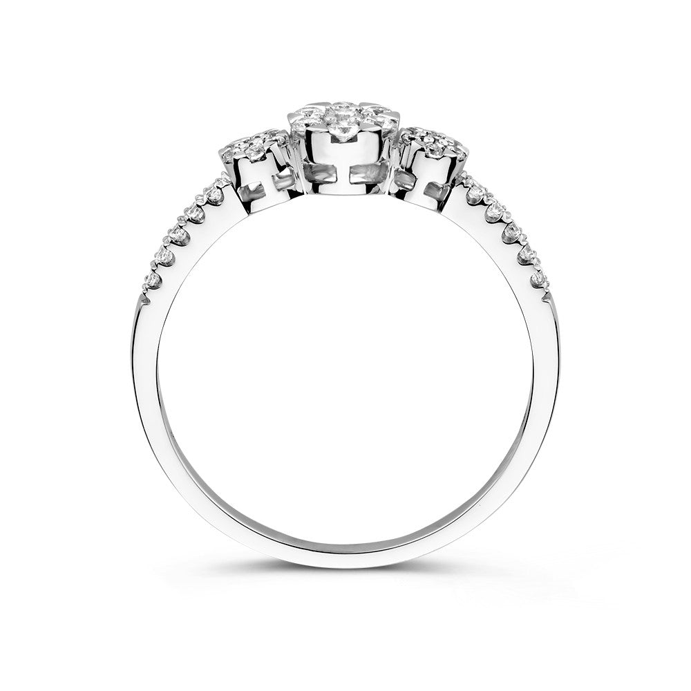 Bague en or blanc à trois pierres avec zircone et pierres latérales