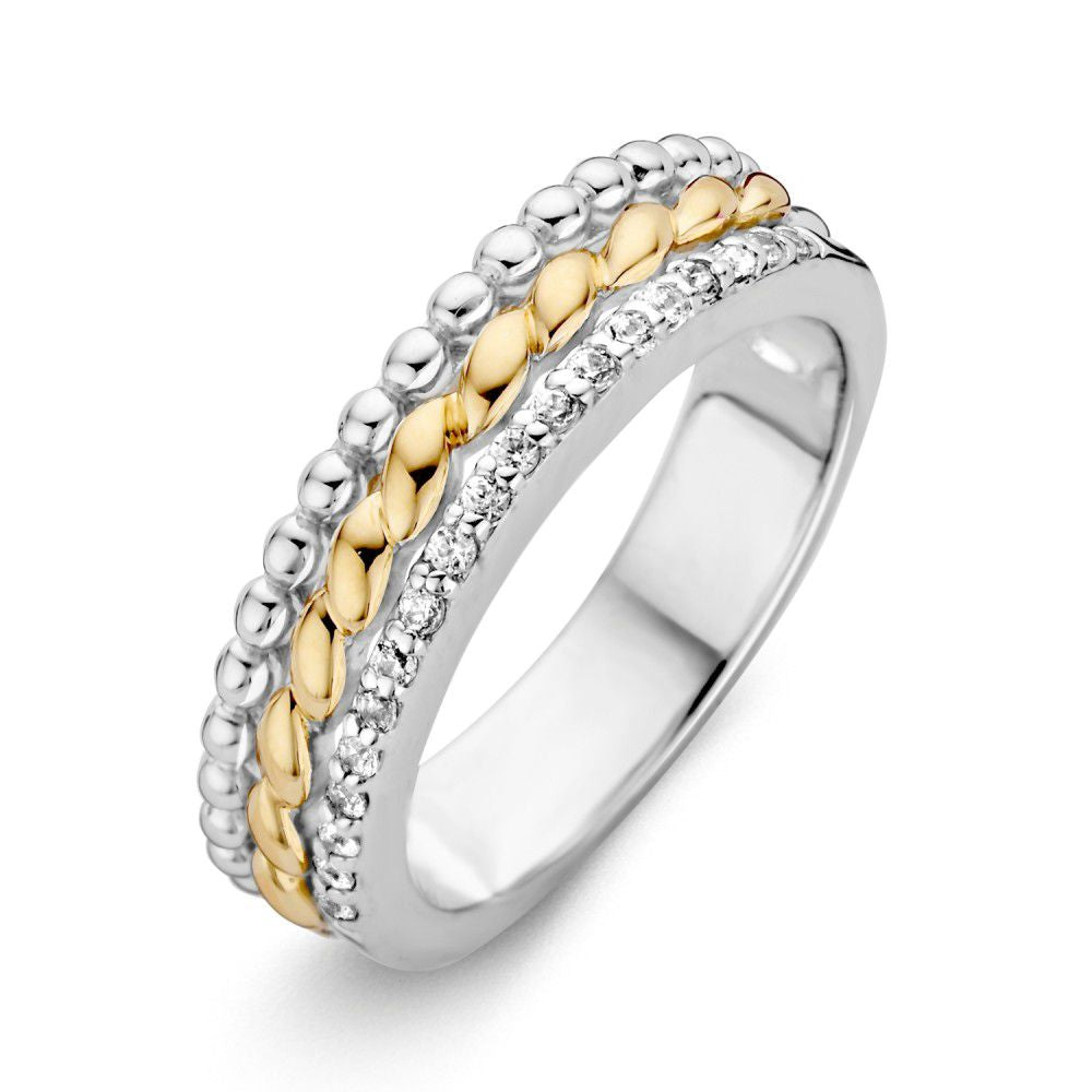 Bague en argent rhodié pour femme avec des détails en or 14 carats et zirconiums, largeur 6,1 mm.
