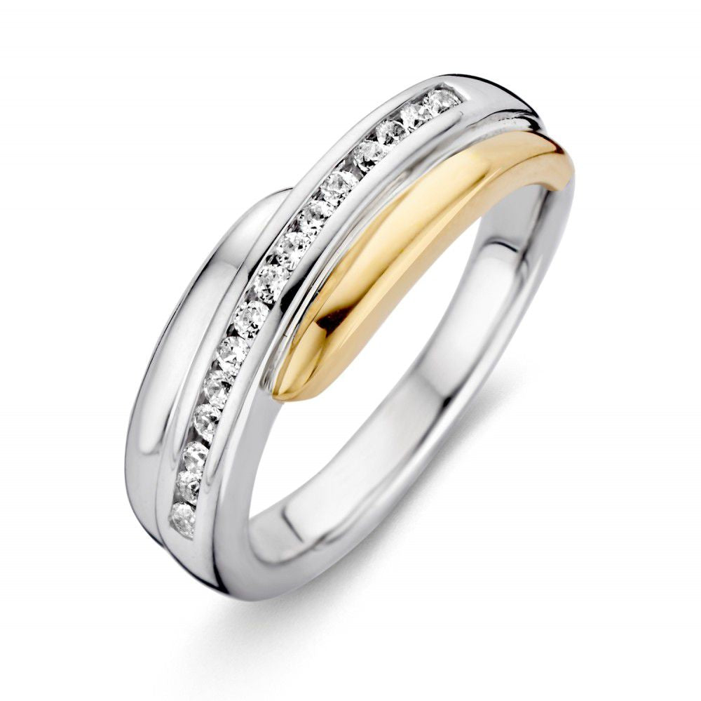 Bague en argent pour femme avec sertissage en or jaune 14 carats et zirconiums blancs.