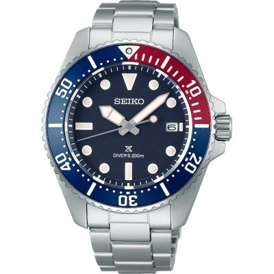 Montre Seiko Prospex Sea avec boîtier en acier inoxydable, cadran bleu et lunette rouge et bleue.