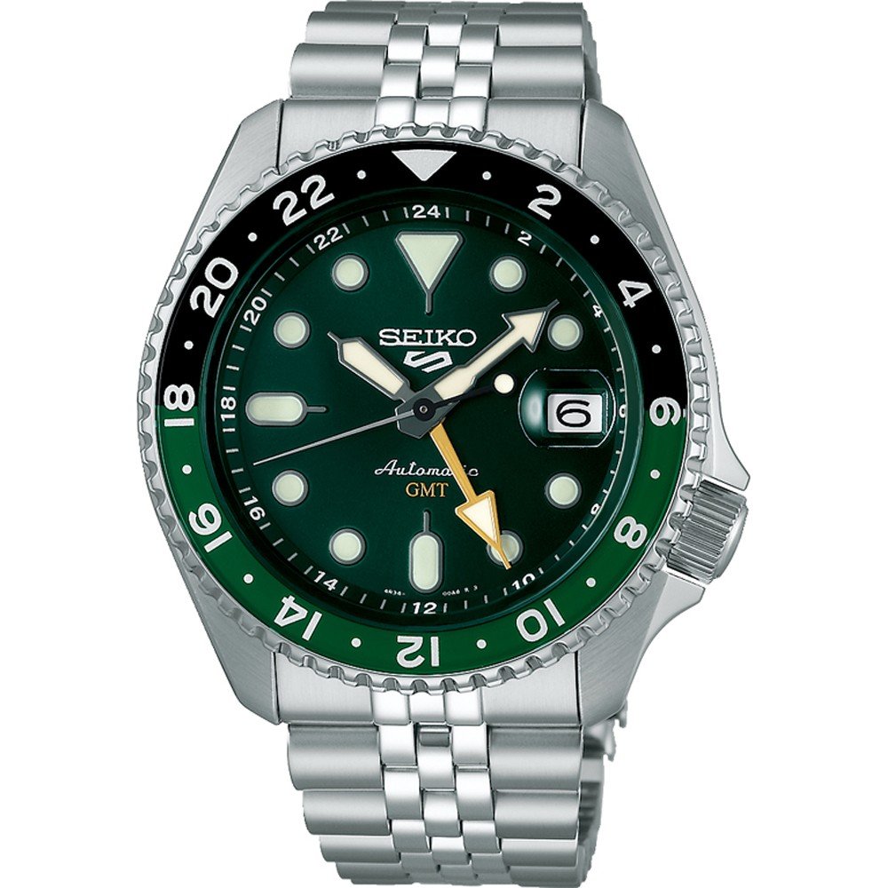 Montre Seiko 5 Sports avec boîtier en acier inoxydable, cadran vert, lunette noire et bracelet en acier.
