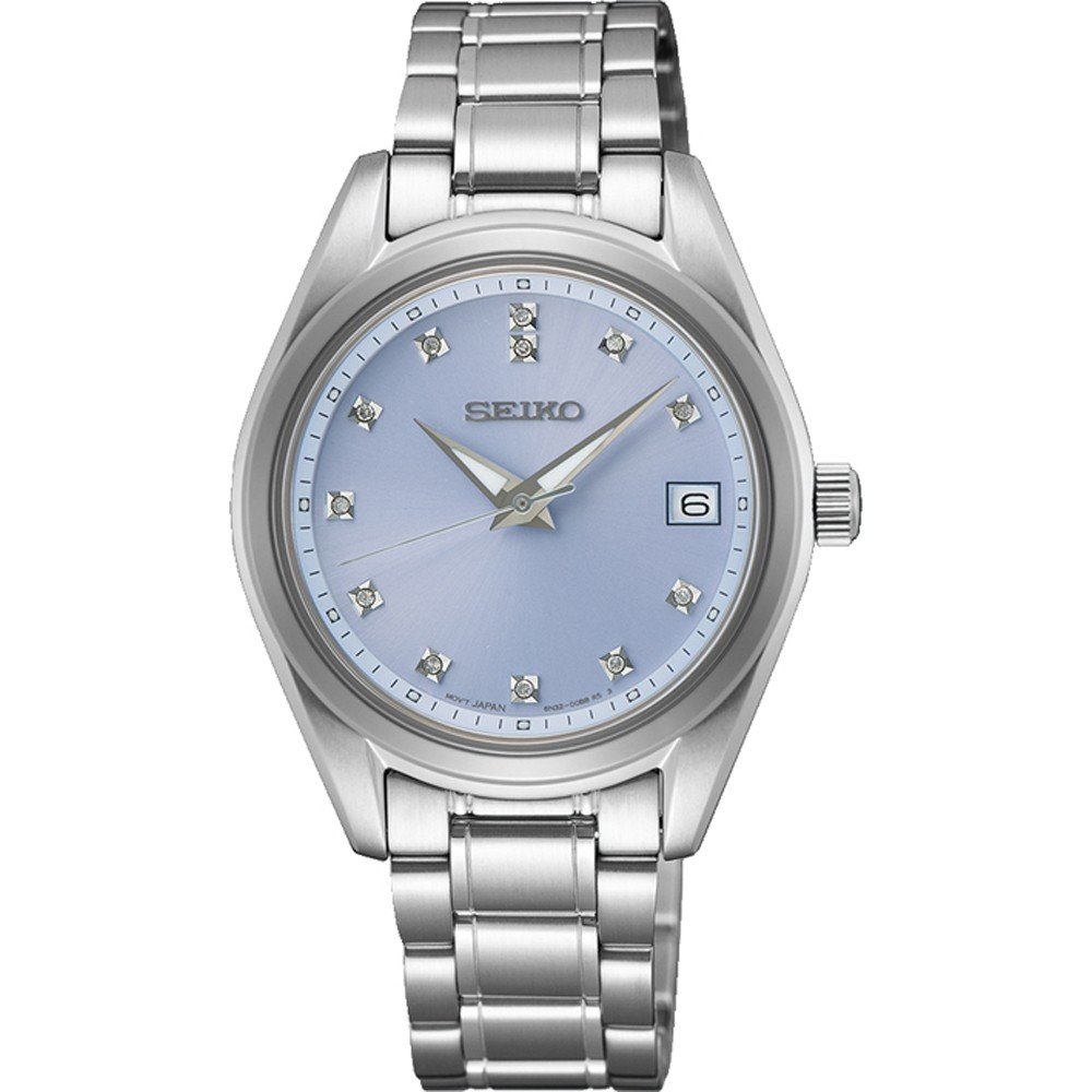 Montre Seiko en acier inoxydable avec cadran bleu clair et diamants, affichant la date.