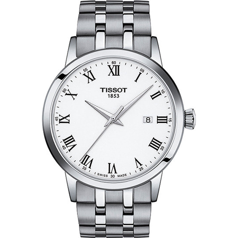 Montre Tissot Classic Dream avec un cadran blanc, boîtier en acier inoxydable et bracelet en métal.