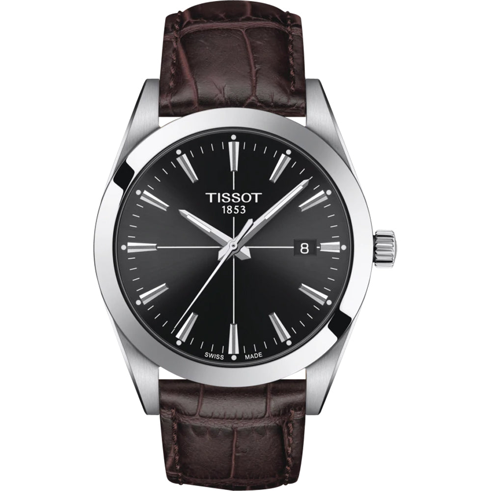 Montre Tissot avec boîtier en acier inoxydable, cadran noir et bracelet en cuir marron.