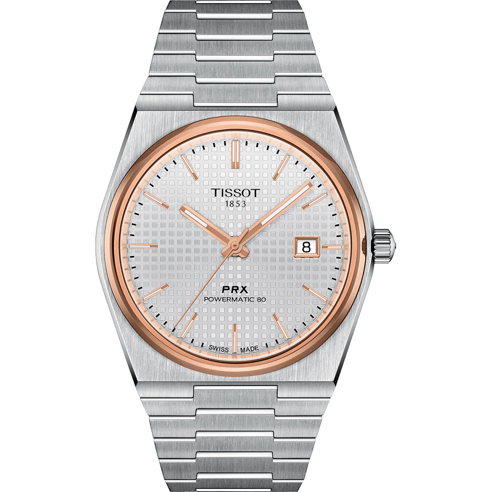 Montre Tissot PRX Powermatic 80 en acier inoxydable avec cadran argenté et aiguilles dorées.