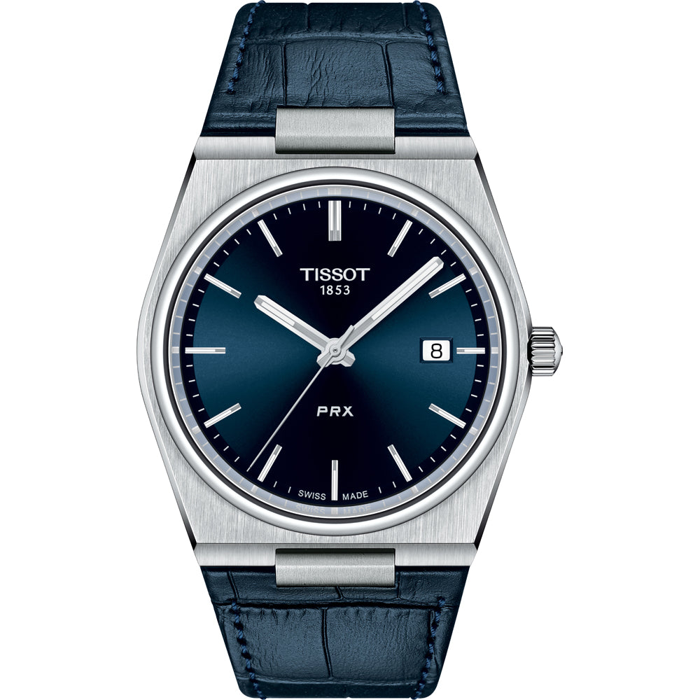 Montre Tissot PRX avec un cadran bleu, boîtier en acier inoxydable et bracelet en cuir bleu.