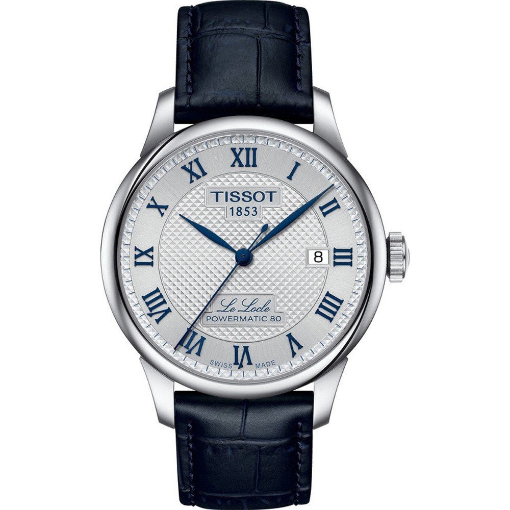 Montre Tissot Le Locle avec un cadran argenté, boîtier en acier inoxydable et bracelet en cuir bleu.