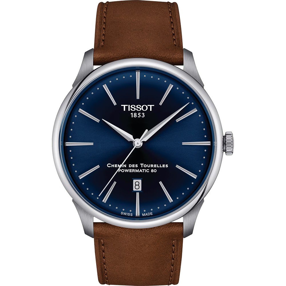 Montre Tissot Chemin des Tourelles avec cadran bleu, boîtier en acier inoxydable et bracelet en cuir marron.