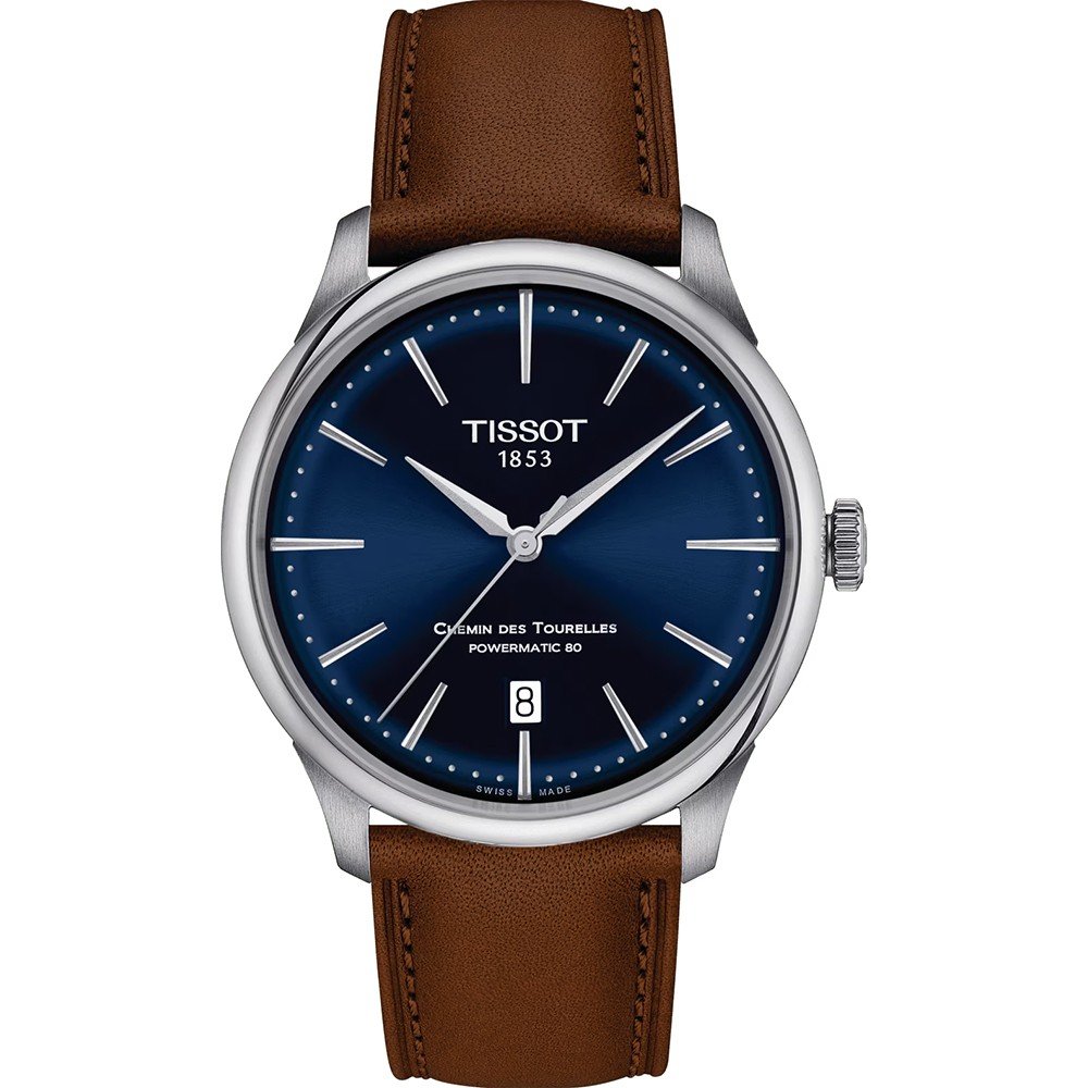Montre Tissot Chemin des Tourelles avec cadran bleu, boîtier en acier inoxydable et bracelet en cuir marron.