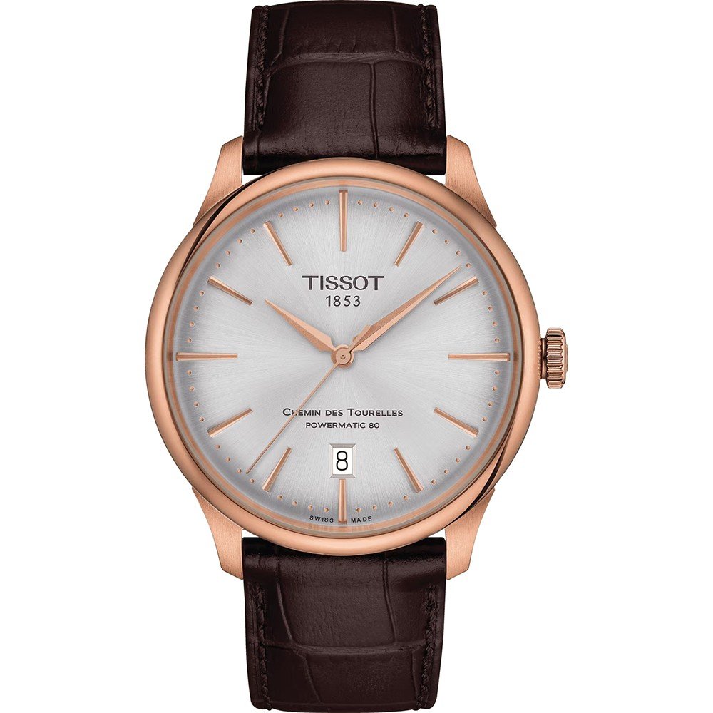 Montre Tissot Chemin des Tourelles avec boîtier en acier rose, cadran argenté et bracelet en cuir brun.
