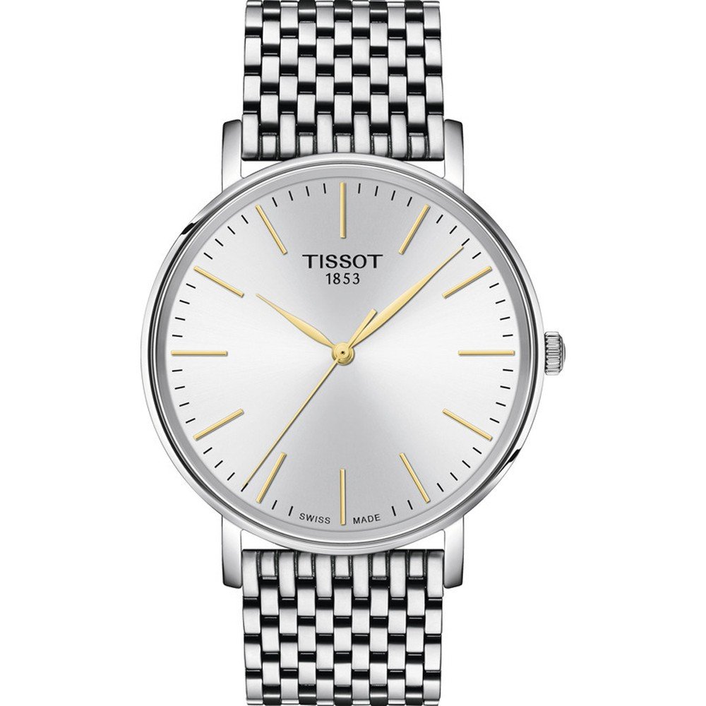 Montre Tissot avec un cadran argenté, boîtier en acier inoxydable et bracelet en maille.