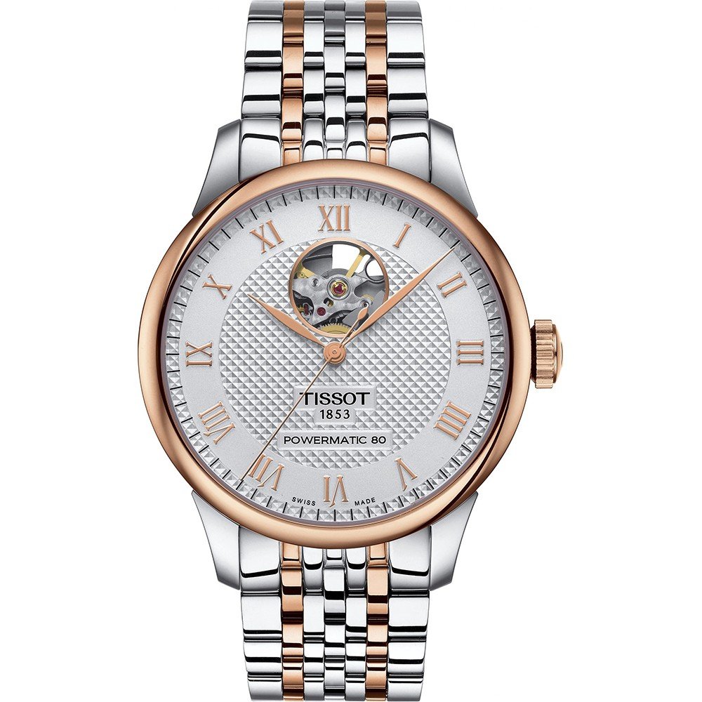 Montre Tissot Le Locle avec boîtier en acier inoxydable argenté et rose, cadran argenté, et bracelet en acier à maillons.