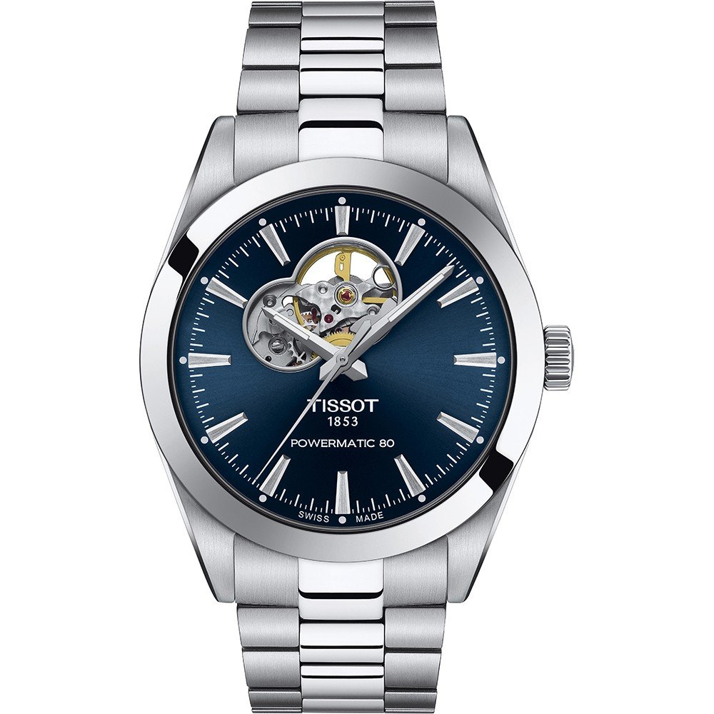 Montre Tissot avec un cadran bleu, boîtier en acier inoxydable et mouvement visible.